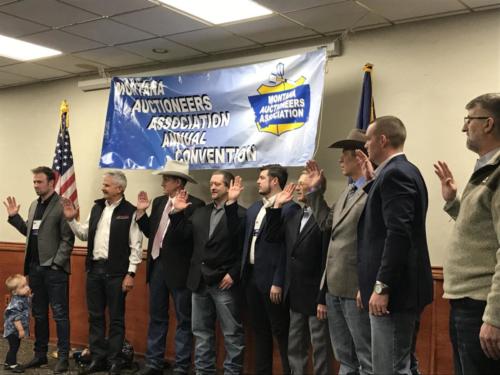 The 2020 Montana Auctioneer Association Board of Directors sworn in by Peter Gehres. Left to right: Wade Affleck, Merton Musser, Kevin Hill, Brian Young, Tucker Markovich, Robert McDowell III, J.K. Kinsey, Reed Tobol, Gideon Yutzy. Not pictured Nick Bennett. 