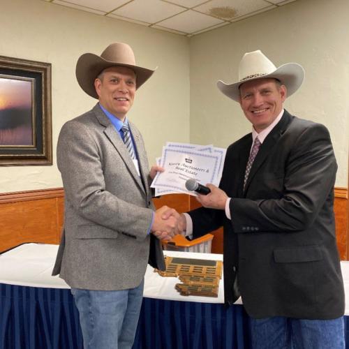 J.K. Kinsey with Kinsey Auctioneers and Real Estate accepts the Marketing Competition awards from MAA President Kevin Hill. 